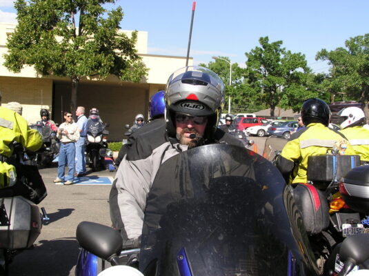 Last grins before the green flag Last grins before the green flag (2005 Iron Butt Rally, Denver)