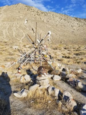 Driftwood sculpture on the slope