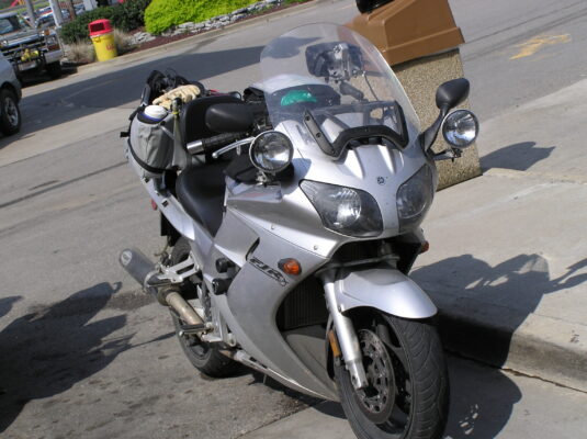 Silver sport-tourer at the pumps