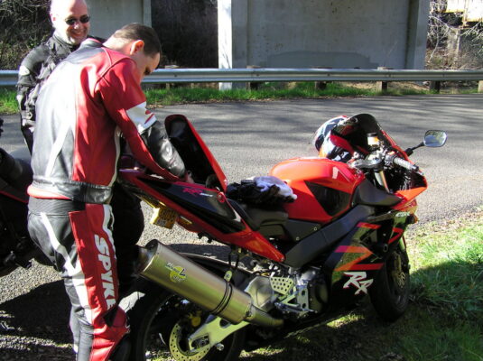 Red leathers, red bike