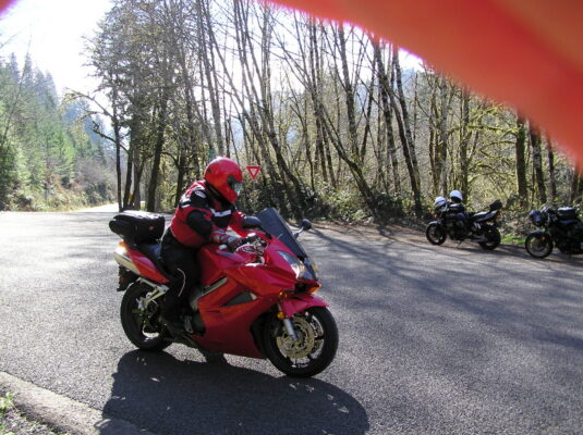 Rider in red rolling in