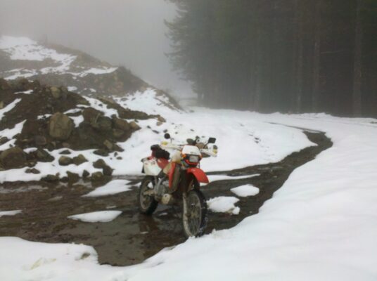Parked in the snow on the logging road